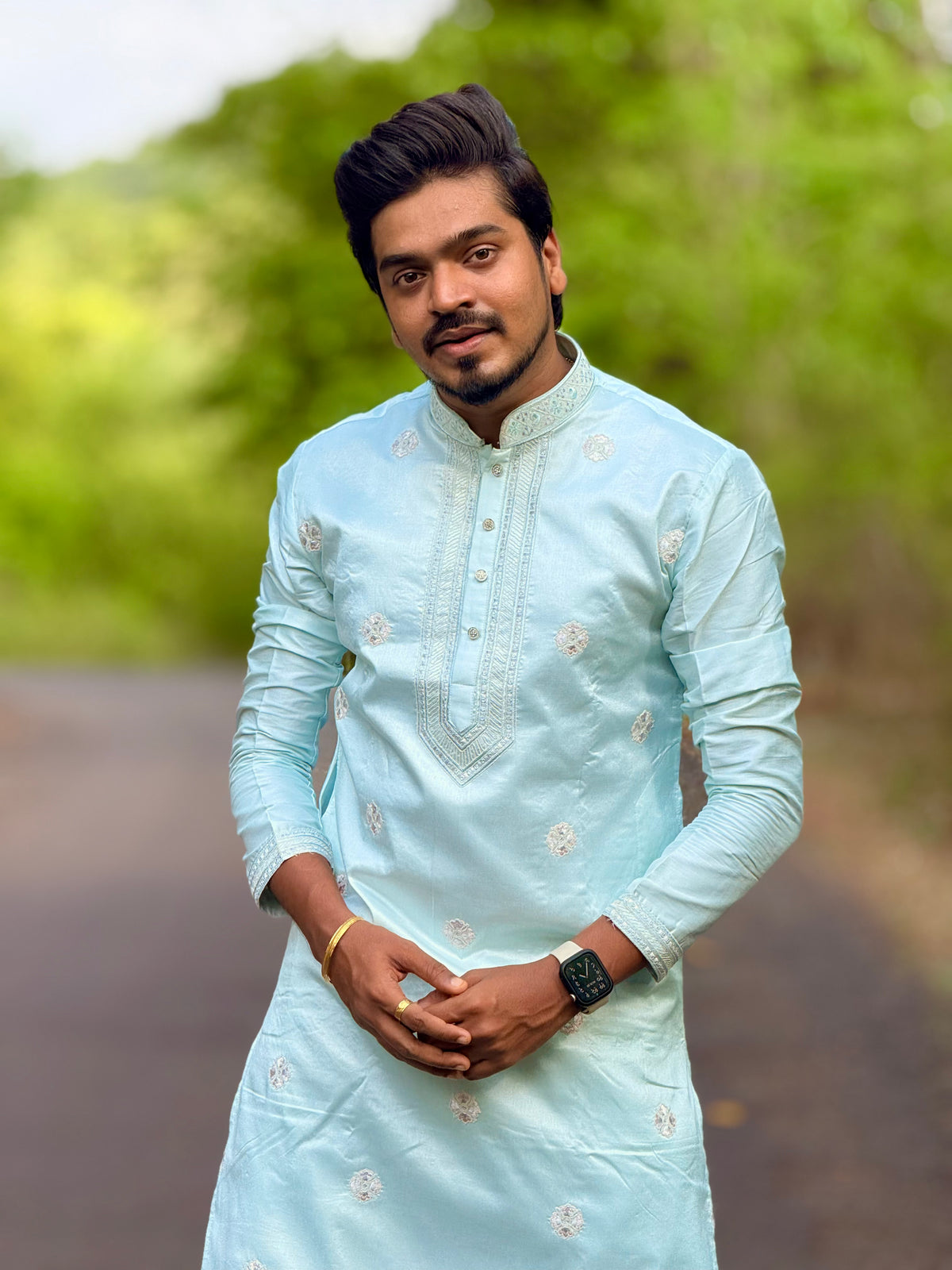 Sky blue neck work embroidered kurta.