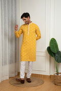Yellow Cotton Kurta with Embroidered Sequined Buttis and Off-White Pant Set